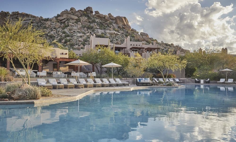 Pool below the boulder-covered hillside at Four Seasons Resort Scottsdale at Troon North