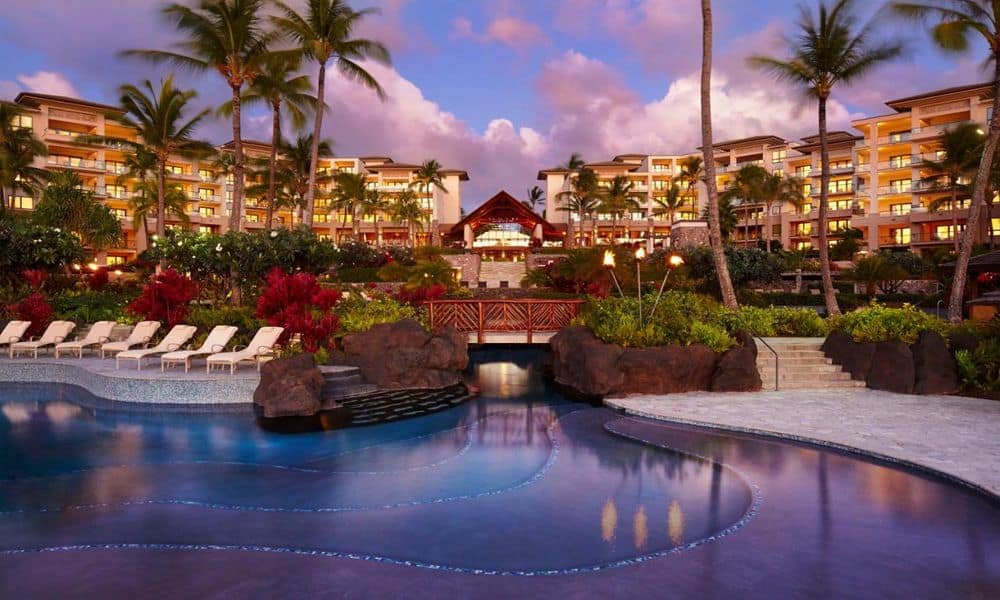 Tiered pools at dusk in front of the residence buildings at Kapalua Bay, Maui