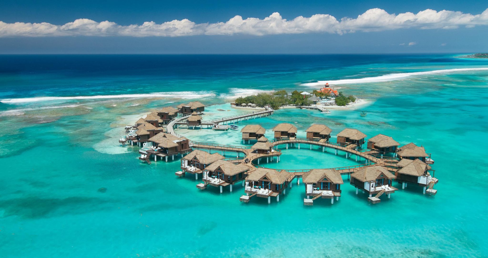 Overwater villas in a heart-shaped layout off Sandals Cay, Montego Bay