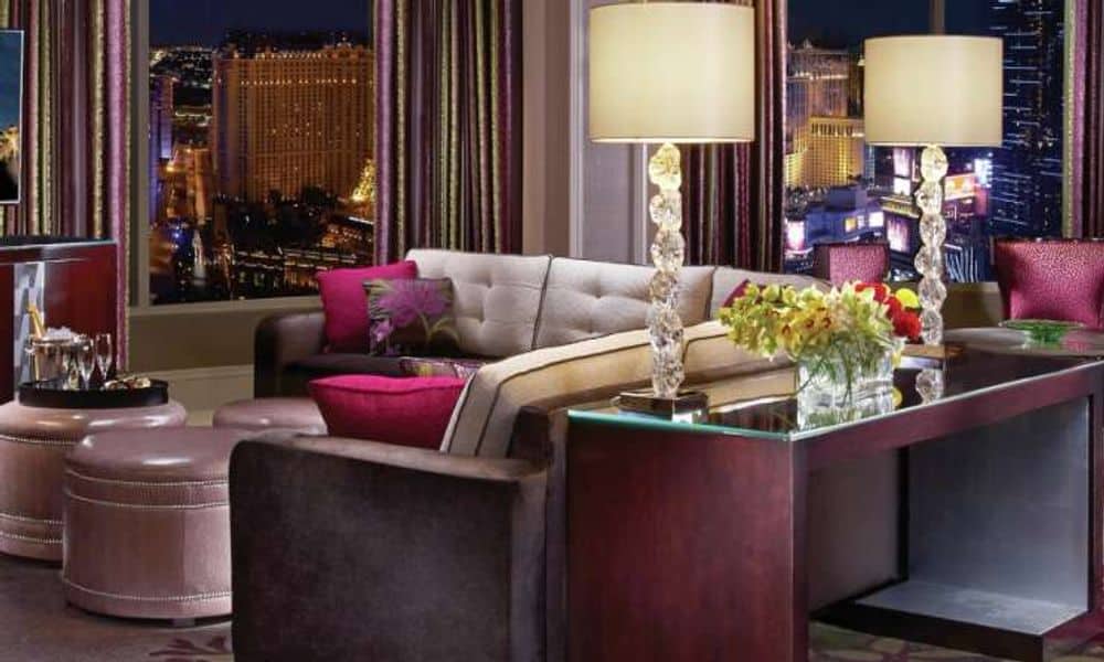 Bellagio suite living room overlooking the Strip at night