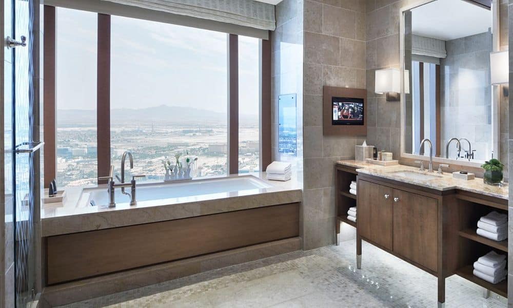Bathroom with soaking tub and window at The Venetian Resort