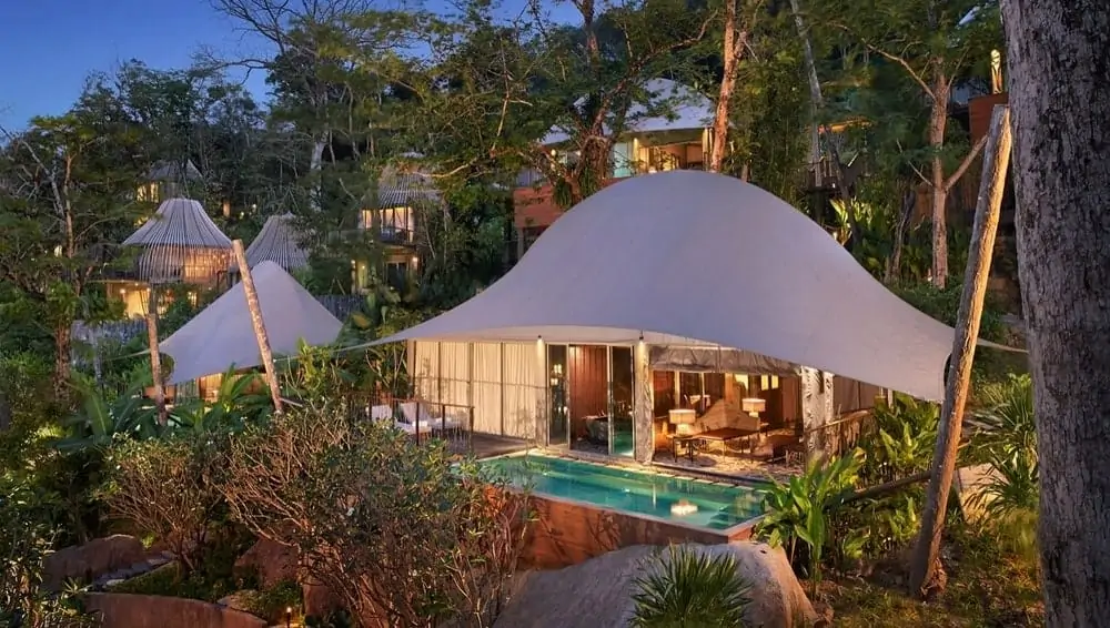 Keemala's Tent Pool Villas on a forested hillside, with a private pool in front of one villa